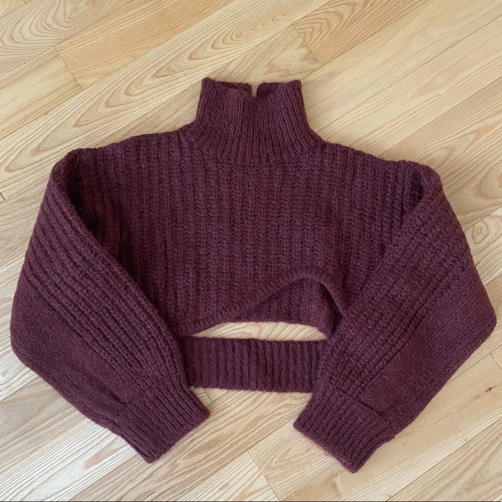 Curved Cut Out Turtleneck Sweater